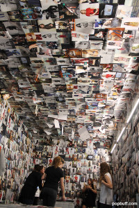 Poster Room which is covered, floor to ceiling, in photographs by Bruce Weber and Annie Leibovitz