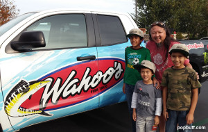 Wing Lam with the Freibrun boys wearing Wahoo's caps