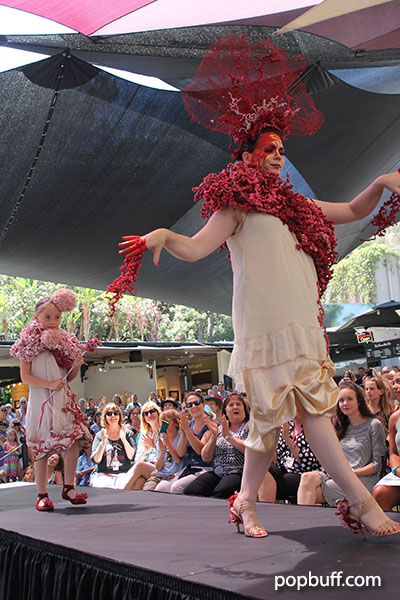 Most Creative Concept by artist Mariana Nelson. Outfits were made of dry cleaning bags with twisted red newspaper bags