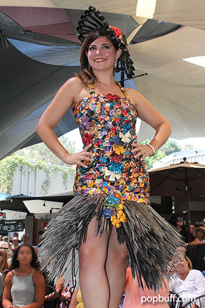  Most Innovative Use of Materials by John Tolle. The outfit is a donated dress which made up of Nespresso coffee capsules with a skirt made from cardboard boxes.