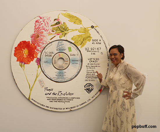 Ruchel Freibrun with Prince and the Revolution record replica at Frieze LA