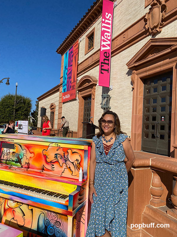 Ruchel Freibrun in front of the Wallis Annenberg Center at the Sing for Hope Pianos event