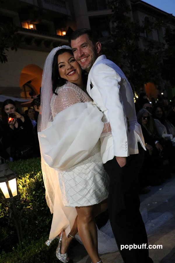 Johana Hernandez and fiancé John Daniel Hutton during the 2023 Glaudi Fashion Show in Beverly Hills - Popbuff.com