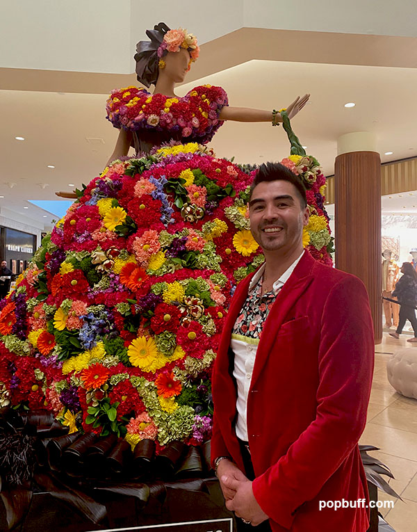 David Navarro, the Senior Lead Floral Designer of CJ Matsumoto & Sons representing the Mexico Mannequin at the Fleurs de Villes VOYAGE in South Coast Plaza in Costa Mesa, CA - Popbuff.com